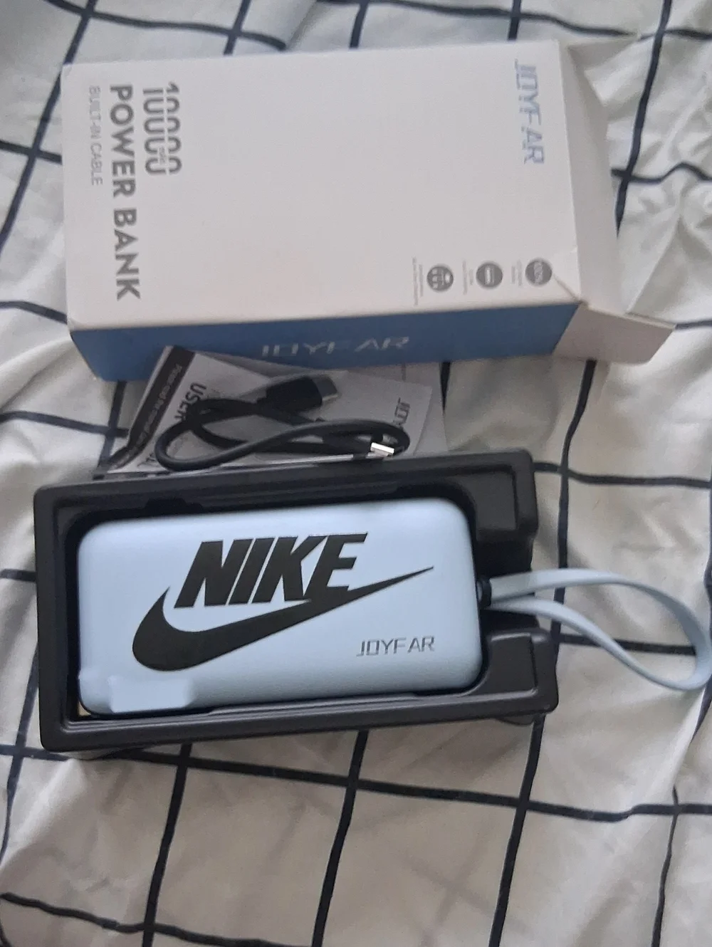 Nike Light Blue Portable Power Bank with Black Logo